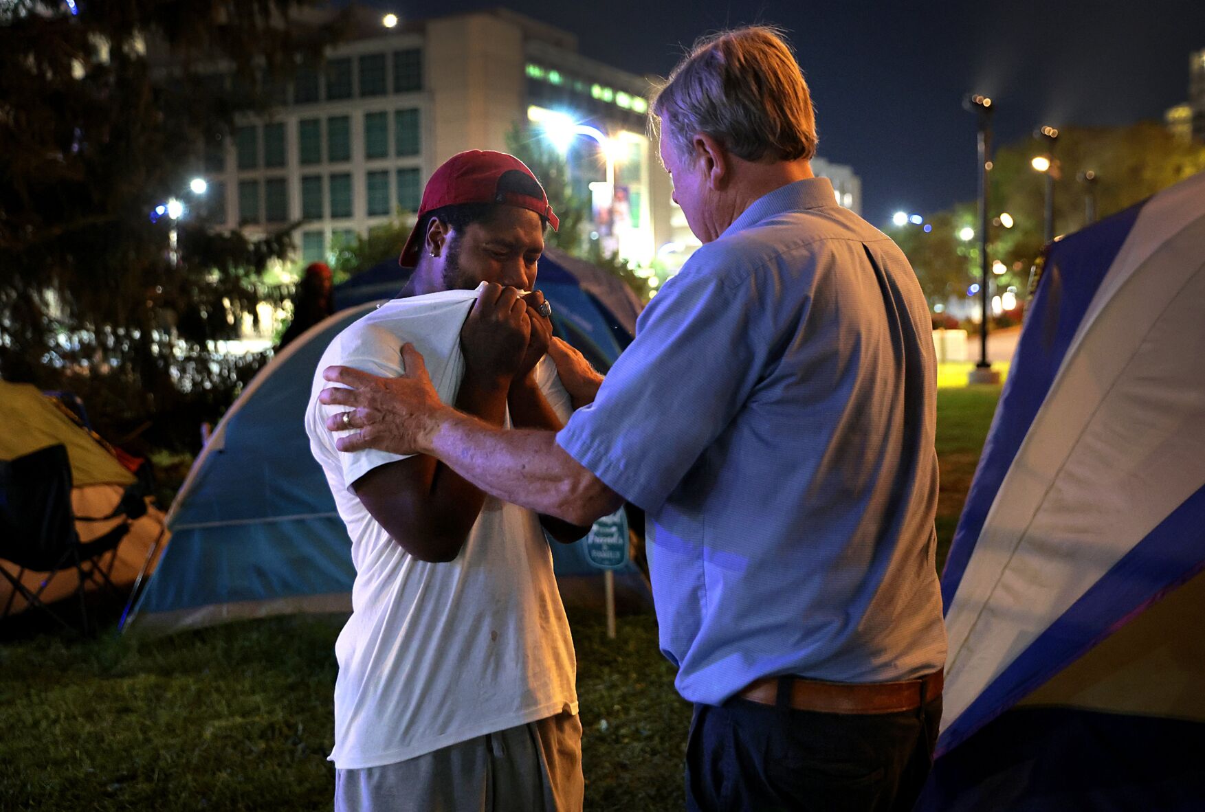 City Hall tent camp, threatened with closure, survives the night